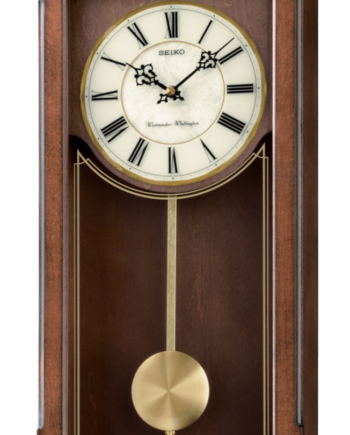 Arched Wall Clock w/ Pendulum & Dual Chaime #8709 Add a touch of traditional elegance to your home with this pendulum wall clock with gold-tone accents. It features a Westminster/Whittington chime, quarter hour chime, volume control, and nighttime silencer. WALL CLOCK WITH PENDULUM AND DUAL CHIMES Dimensions: 10" x 21" x 4"
