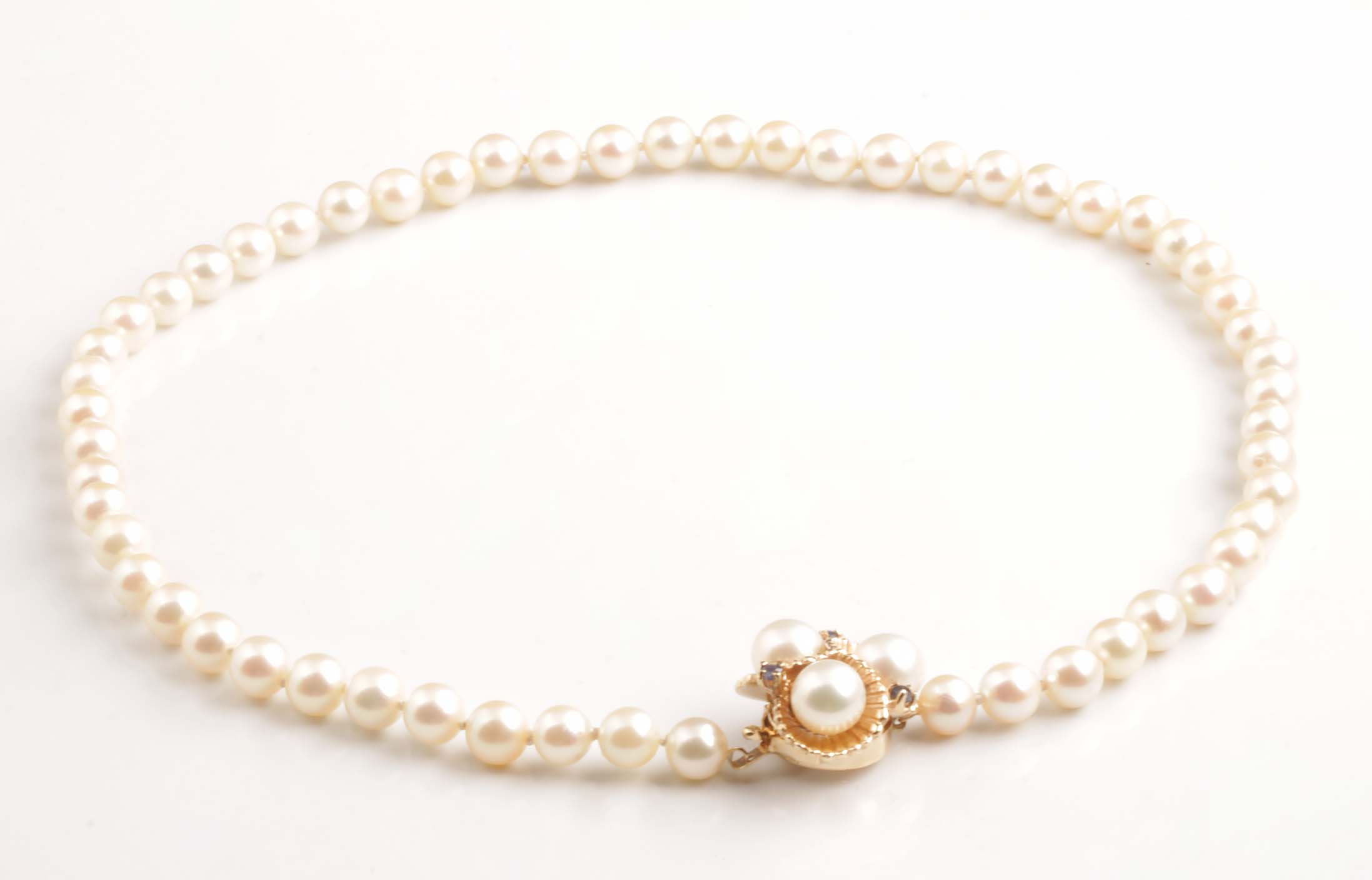 14KTG 18" Cultured Pearl strand w/ pearl & sapphire clasp #12255