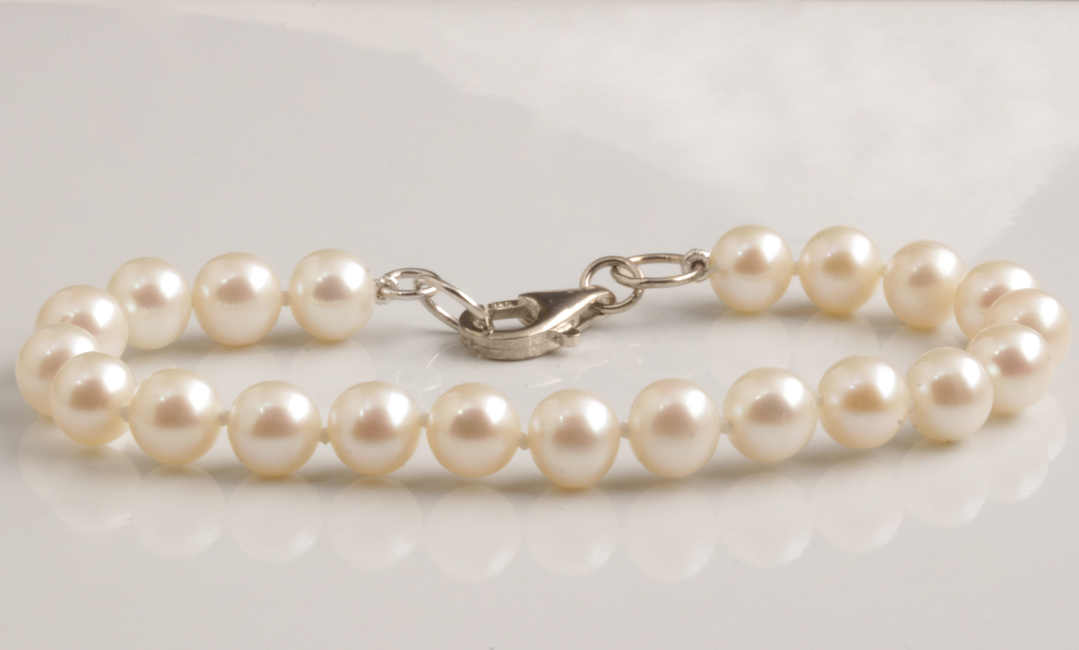 Fresh Water Pearl Bracelet & Necklace Set. 7" bracelet and 18" necklace, both w/ silver clasp. #12428