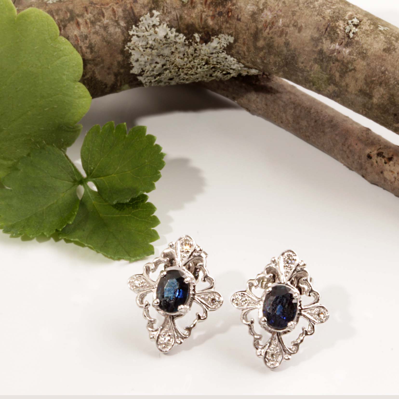14KT White Gold .06 Diamond & Oval Sapphire Earrings #12457