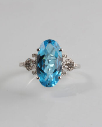 14KT White Gold Oval Blue Topaz w/ .17tdw Ring